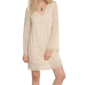 Cream colored dress with crochet detailing